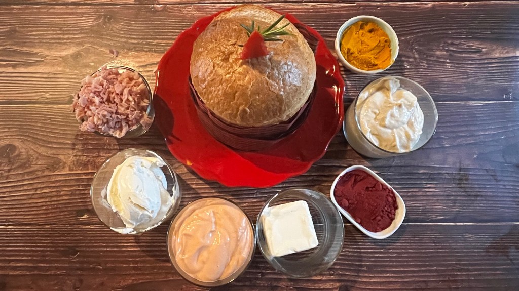 Panettone with  the savory sauces to serve it with.